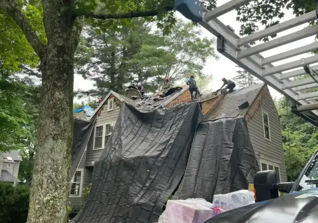 Imgi 60 crew performing roof replacement